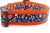 Fall leaves dog collar design with multicolored leaves, acorns and mushrooms on a navy blue background with 1.5 inch wide orange nylon.