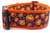 Happy Jack O Lanterns on a black polka dot background.  Coordinating 2 inch wide orange nylon. Happy Jack O Lanterns on a black polka dot background.  Coordinating 2 inch wide orange nylon.