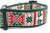 Nordic inspired design with reindeer and snowflakes on 2 inch wide forest green nylon.