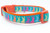 Spring dog collar with orange nylon and aqua background with multicolored rabbits.