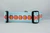 The collar has a repeating pattern of orange pumpkins with pink accents and blue leaves.