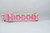 Pink dog collar with repeating pattern of glittery pink pumpkins.