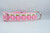 Pink dog collar with repeating pattern of glittery pink pumpkins.