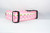 Pink dog collar with repeating pattern of glittery pink pumpkins.
