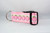 Pink dog collar with repeating pattern of glittery pink pumpkins.