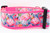 Bright neon pink flamingo collar with a tropical floral background.