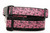 Collar with black nylon and leopard hearts on a pink background.  Top is 1 inch wide and bottom is 1.5 inch wide.