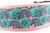 2 inch wide collar with pink nylon and a shamrock rainbow pattern with green background.