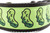Dog collar with bright lime green ribbon with a repeating pickle pattern sewn onto 2 inch wide black nylon webbing.
