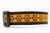 Halloween dog collar with glittery jack o lantern paws on orange background.
