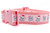 Pink dog collar with a snowflake pattern and santa and bow wearing hippos