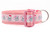 Pink dog collar with a snowflake pattern and santa and bow wearing hippos