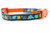 Multicolored fall leaves in brown, orange, lime and blue with swirls and dark blue background on an orange nylon.
