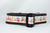 Collar features a repeating pattern of owls, acorns, and leaves on a white background and brown nylon.
