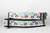 Collar with a New Year's Eve theme.  The collar features penguins wearing party hats, colorful balloons, and confetti.  The text 'Happy New Year' is printed on the collar. 
