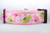 Pink dog collar with a repeating pattern of crabs in pink and green on a white background. 