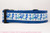 Bright blue assortment of seahorses, flamingos and starfish decorate this blue collar.