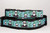 Black nylon collar with pandas on a light blue background with bamboo trees.
