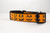 Glittery black Jack O Lantern faces on orange ribbon and black nylon.