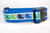 A blue, white, and green dog collar with a repeating pattern of whales.