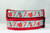 Holiday collar with a white and blue striped pattern with candy canes, red mugs and red coffee cups with snowflakes. 