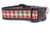 A black dog collar with a red and white plaid ribbon with gold glitter accents.