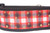 A black dog collar with a red and white plaid ribbon with gold glitter accents.