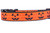 Jack o lantern face on a geometric print with orange background and black nylon.