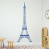 The Eiffel Tower wall decal shown here in denim color on an interior playroom wall.