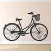 The women's cruiser bike wall decal in black vinyl.