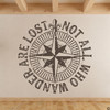 The "Not all who wander are lost" distressed compass rose wall decal shown here in brown vinyl.