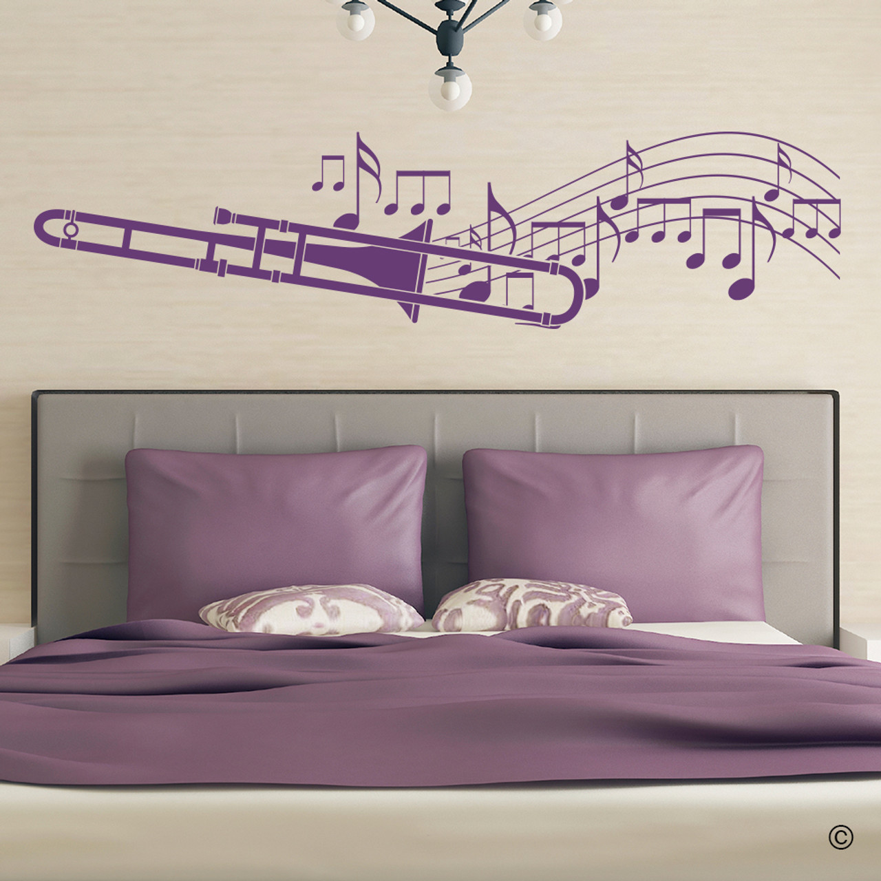 The trombone player with music notes wall decal in violet
