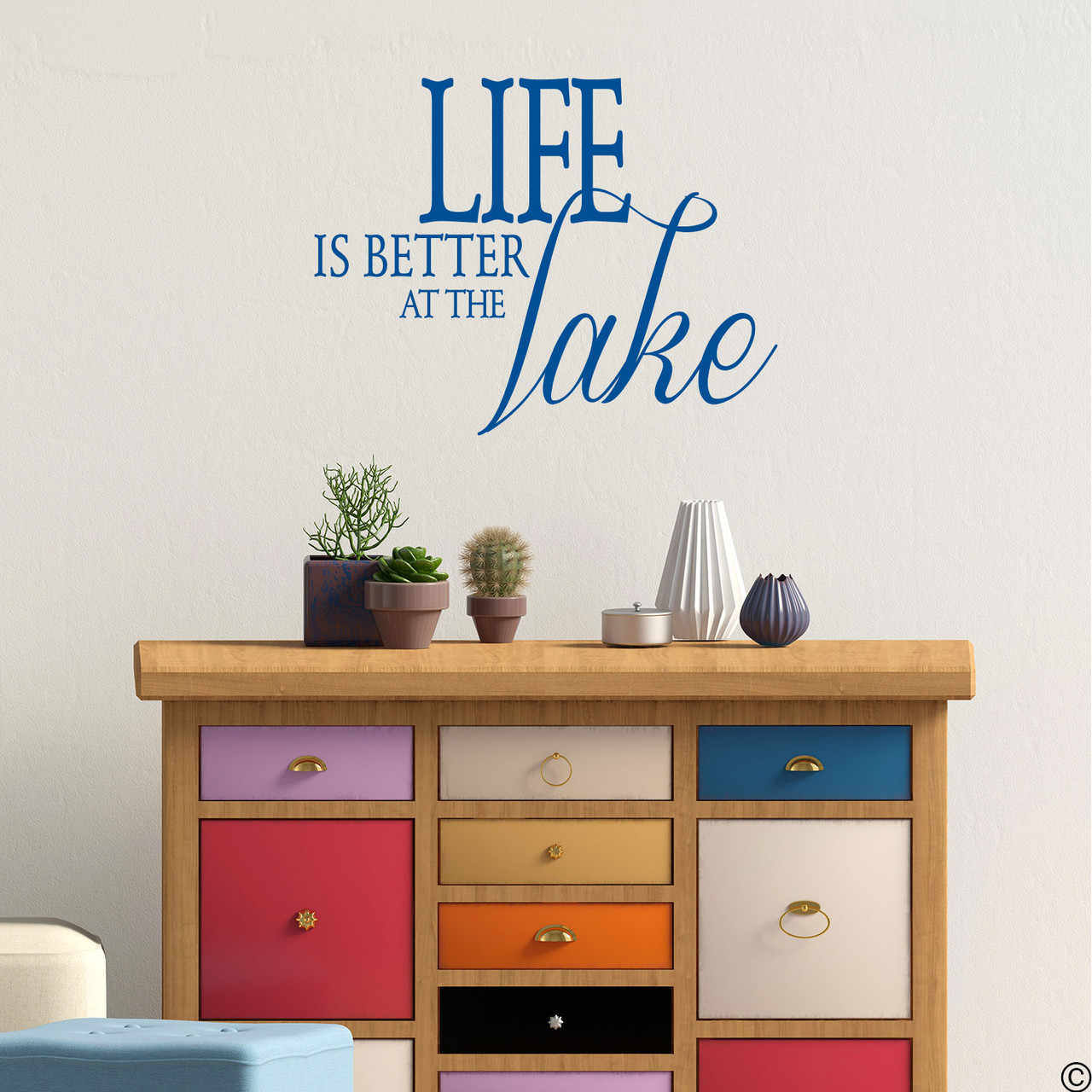 Life is better at the Lake wall decal, on a wall in the traffic blue vinyl color.