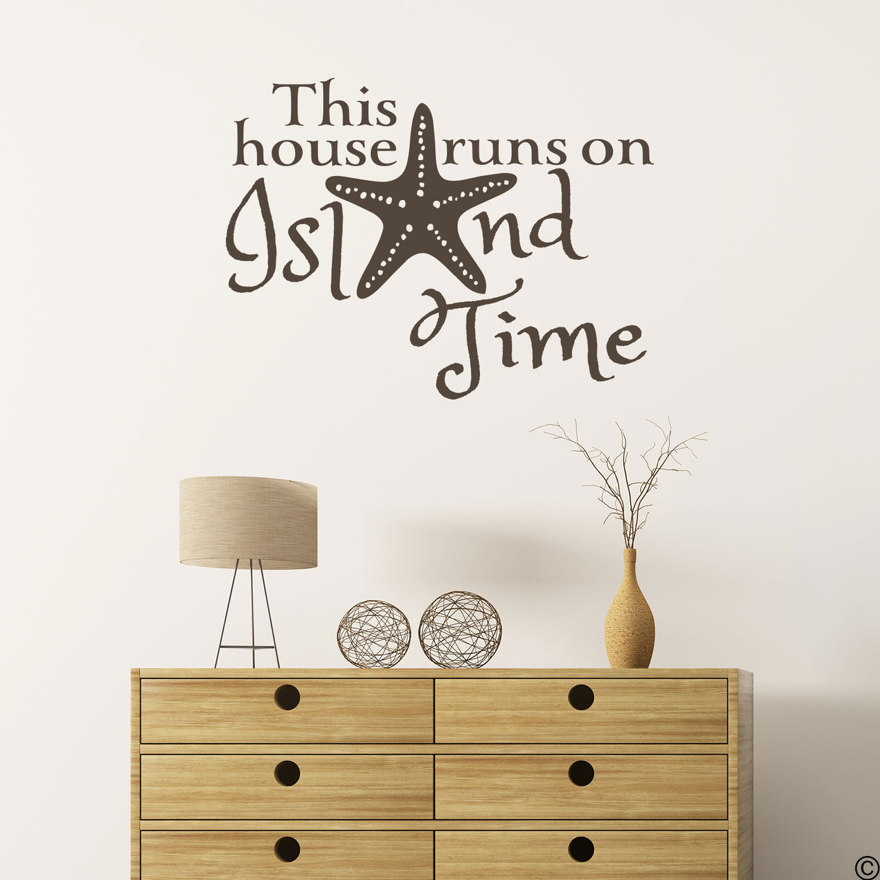 Starfish wall decal with "This house runs on Island Time," quote. Shown here in brown color.