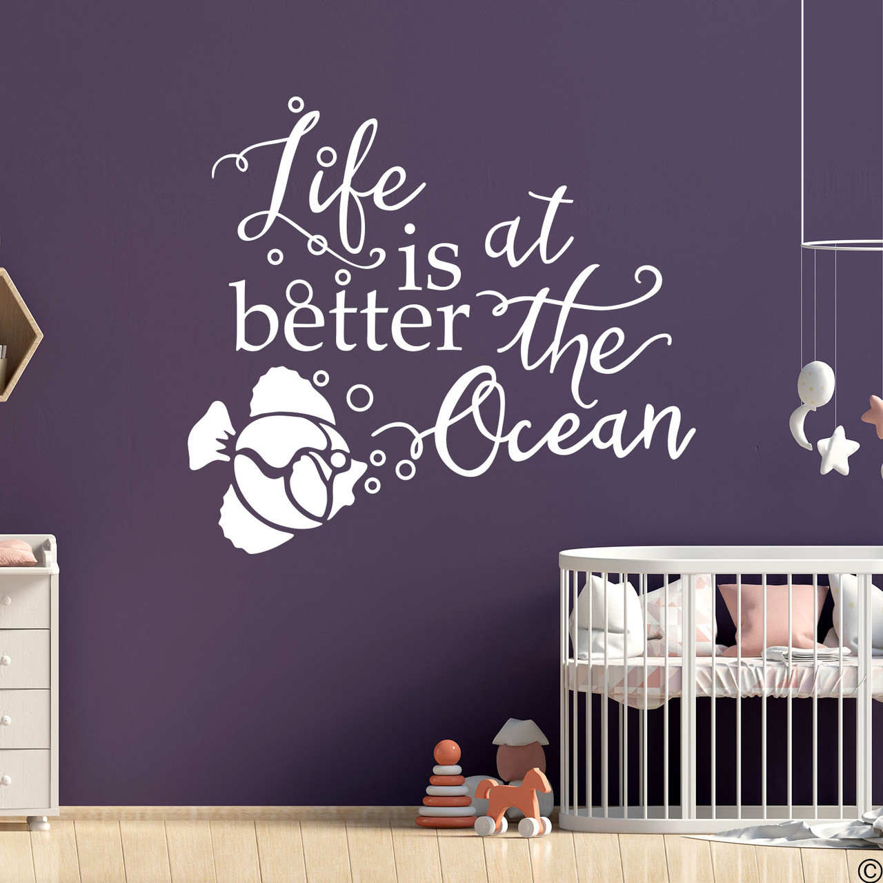 Fish wall decal with "Life is better at the Ocean," quote. Shown here in white color.