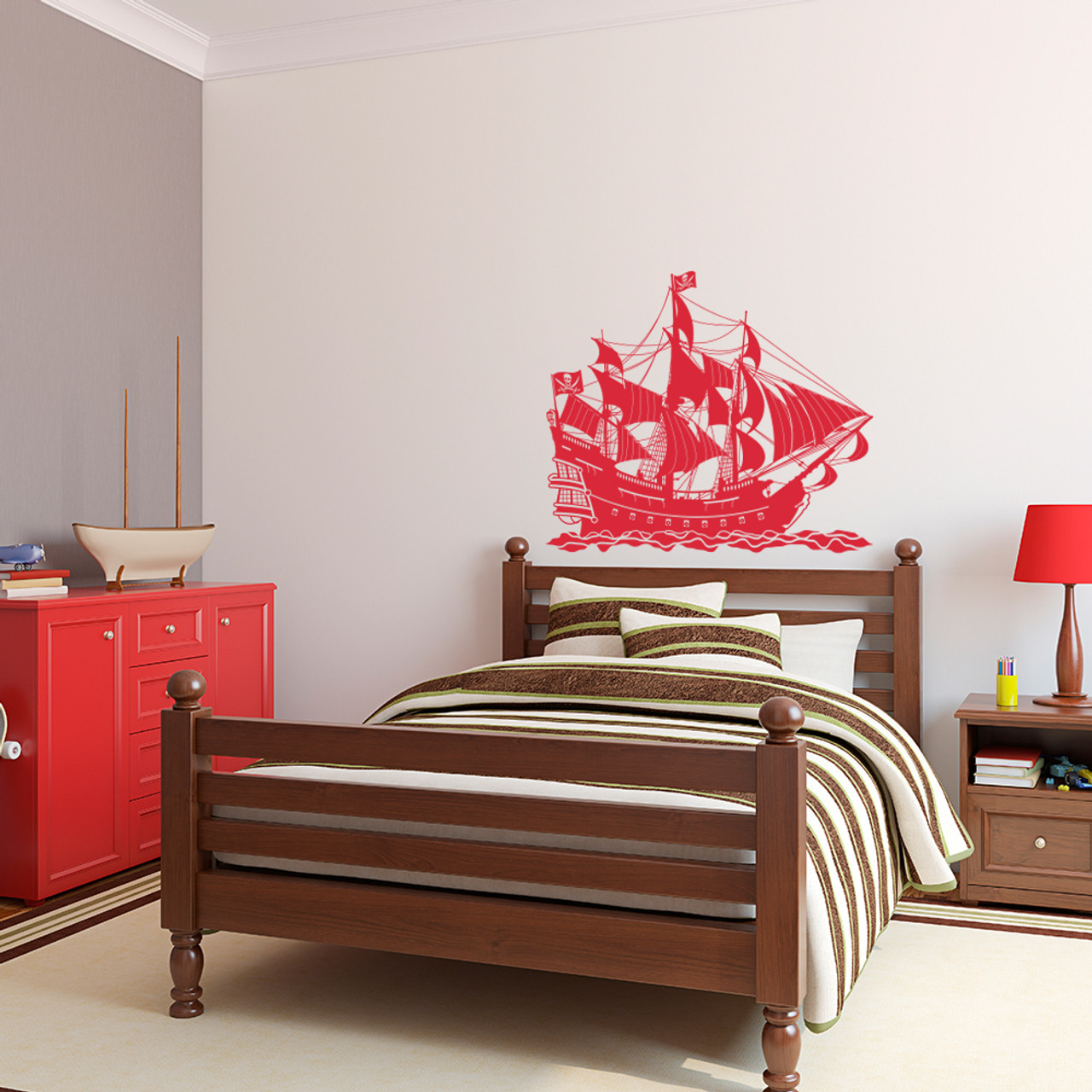 Super cool pirate ship wall decal shown here  in a bedroom in dahlia red.