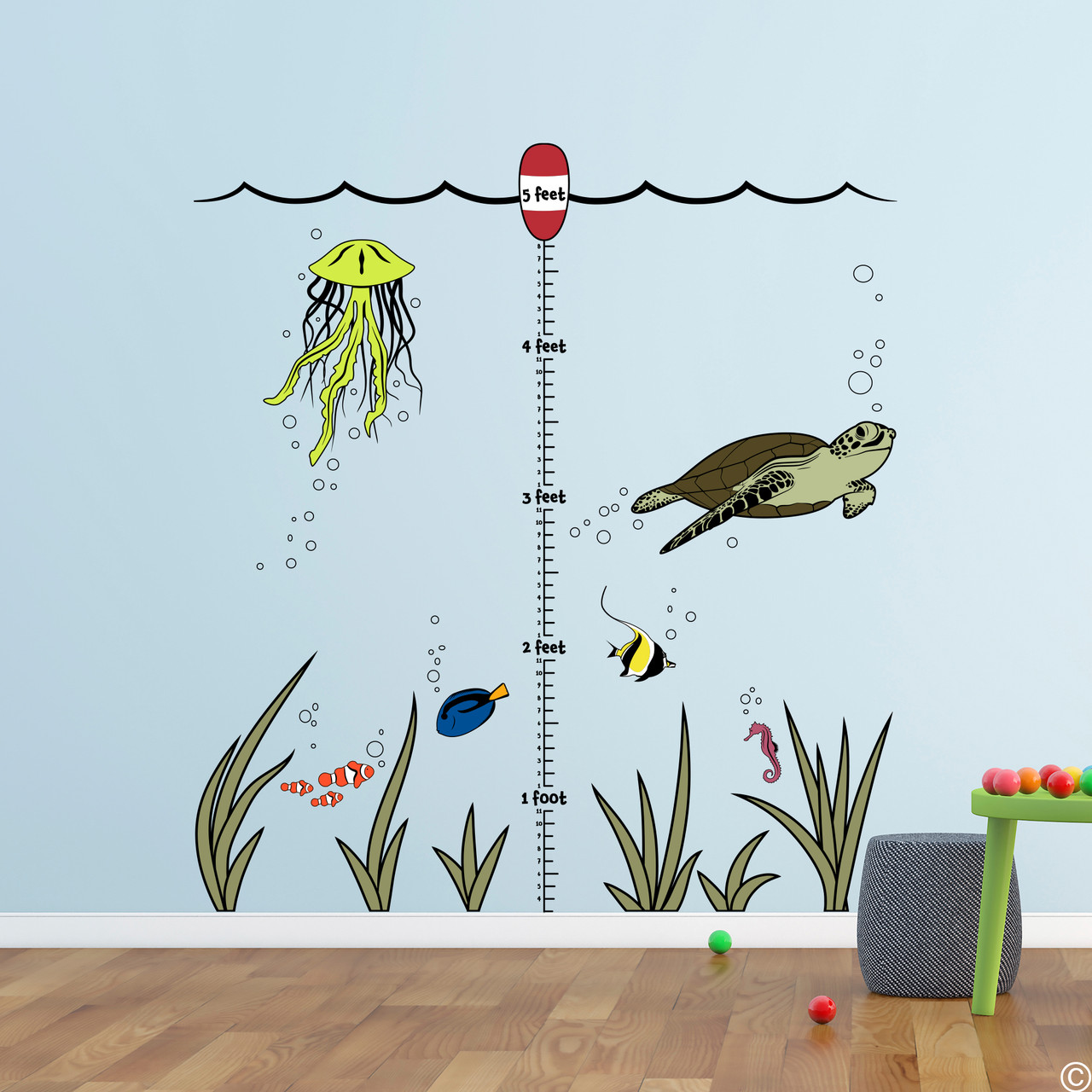 Under the sea growth ruler wall decal. Comes with 5 foot ruler, 1 buoy, waves, 1 sea turtle, 3 clown fish, 1 jellyfish, 6 seaweed tuffs, 1sea horse, 1 surgeonfish, 1 moorish idol fish, and a bunch of bubbles. Place them however you want or as seen here. 