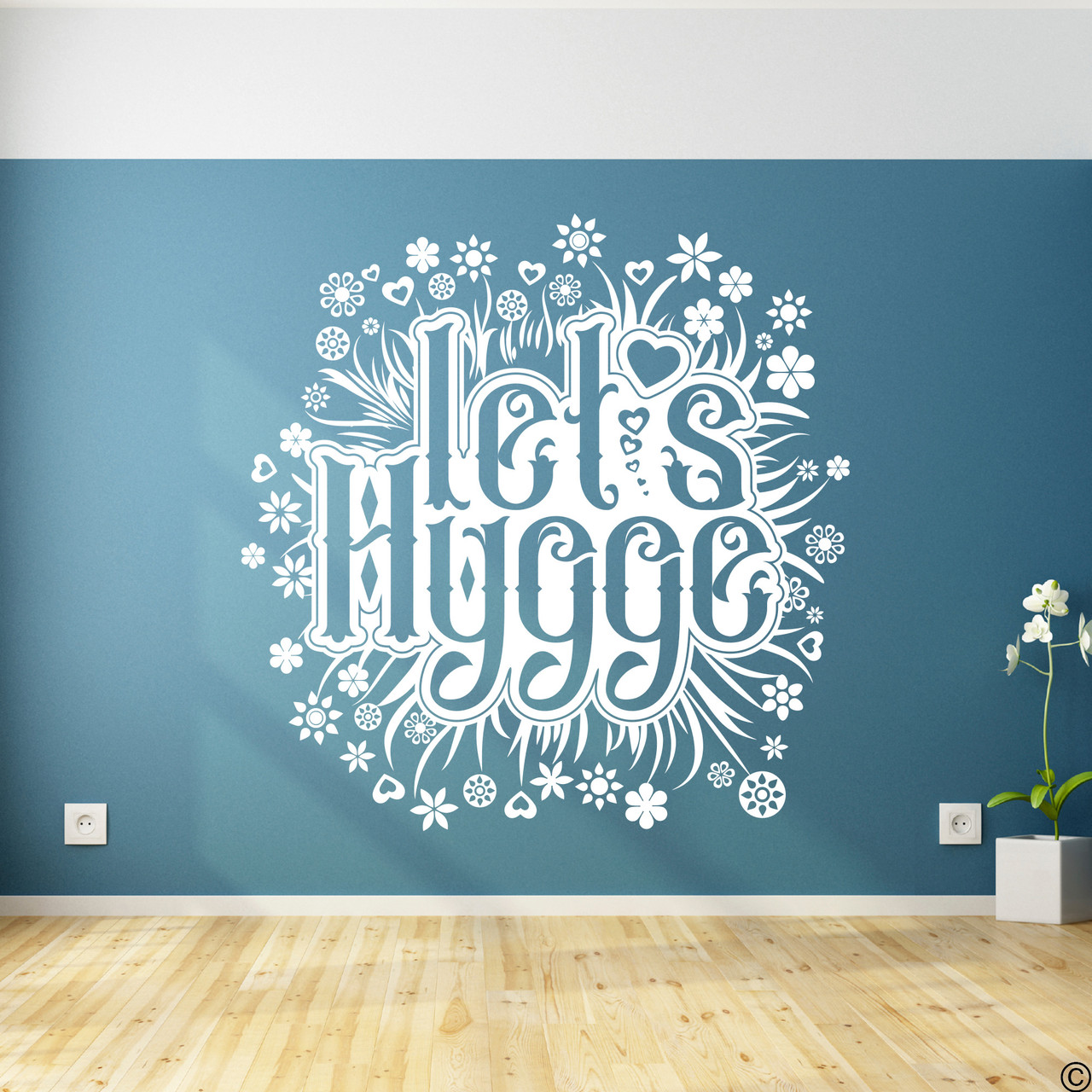 The Let's Hygge wall decal quote in white vinyl color.