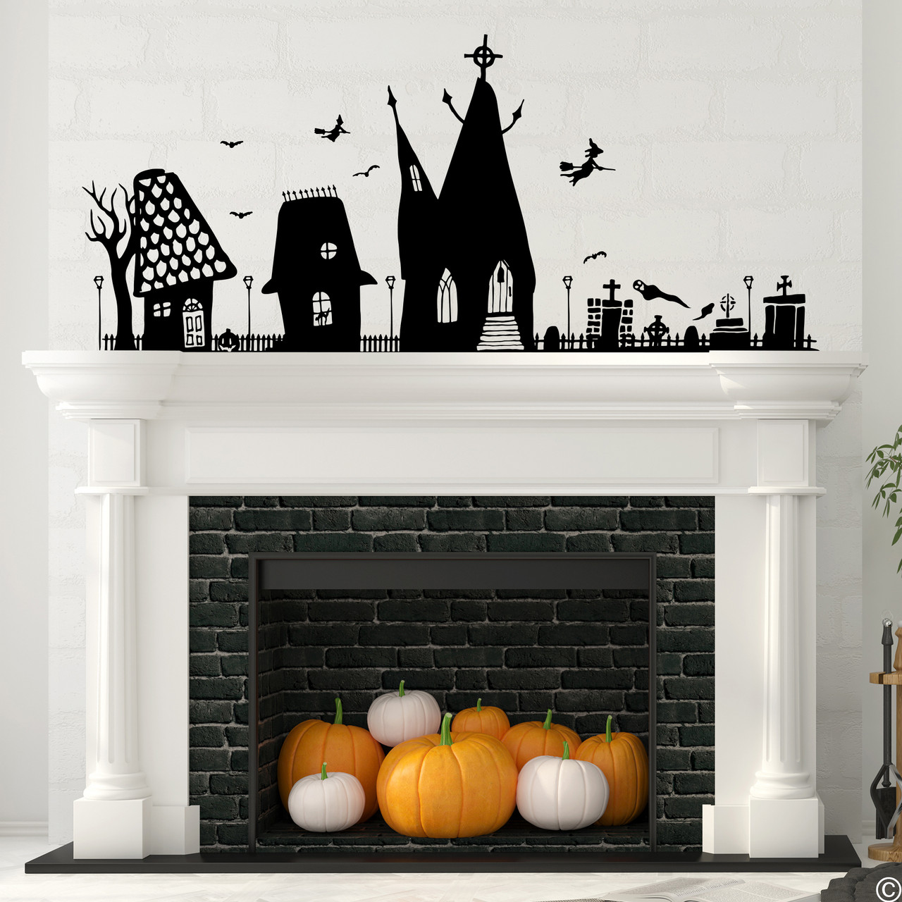 The Halloween houses wall decal in black vinyl color.