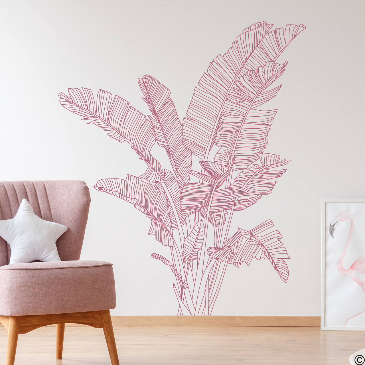 The Bird of Paradise wall decal shown here in lipstick vinyl color on a living room wall.