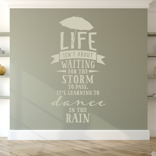Wall quote "Life isn't about waiting for the storm to pass, it's learning to dance in the rain," vinyl wall decal in warm grey