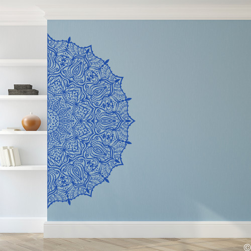 The Eshita Half Mandala vinyl wall decal in traffic blue