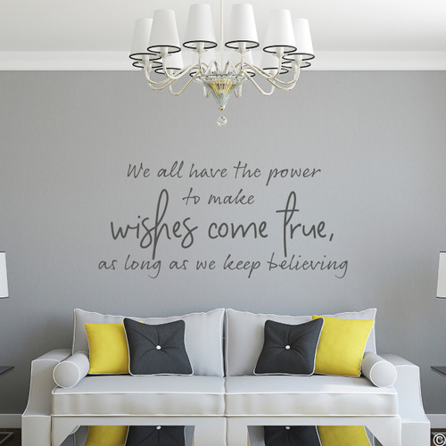 "We all have the power to make wishes come true, as long as we keep believing" vinyl wall decal quote in dark grey