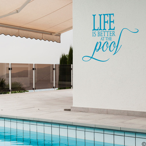 The Life is better at the Pool wall decal, on a outdoor patio wall in the teal vinyl color. The Life is better at the Pool wall decal, on a outdoor patio wall in the teal vinyl color.