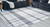 Kaidlow - Gray/Cream - 7'7" x 9'8" Washable Rug (R405911) by Ashley
