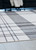 Kaidlow - Gray/Cream - 7'7" x 9'8" Washable Rug (R405911) by Ashley