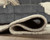 Dallane - Linen/Blue/Green - 5' x 7' Rug (R406352) by Ashley
