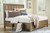 Cabalynn - Light Brown - California King Panel Bed with Storage (B974B9) by Ashley