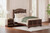 Glosmount - Two-tone - Queen Poster Bed (B1055B2) by Ashley