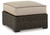 Coastline Bay - Brown - Outdoor Ottoman with Cushion (P784-814) by Ashley